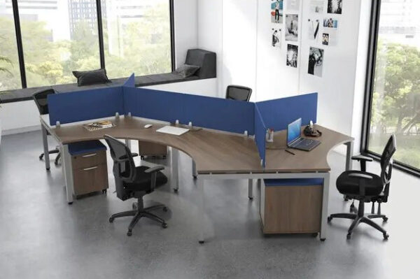 Modern office with three workstations and chairs.