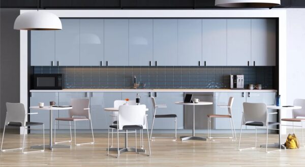 Modern office kitchen with tables and chairs