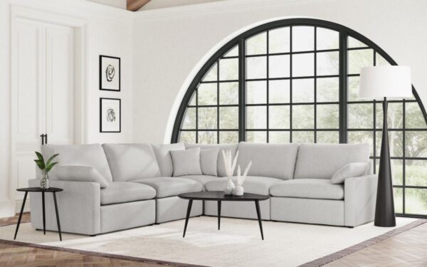 Modern living room with gray sectional sofa.