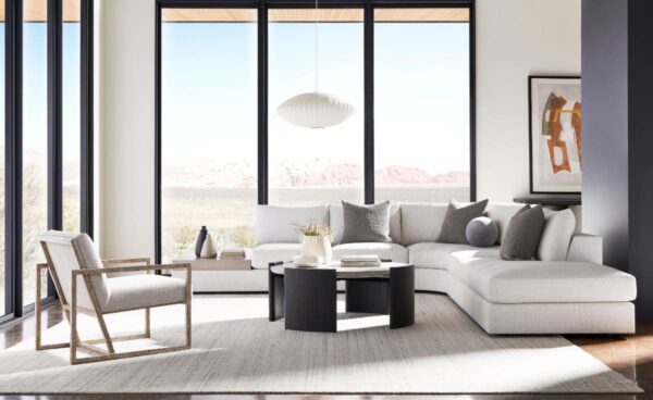 Modern living room with large windows and seating