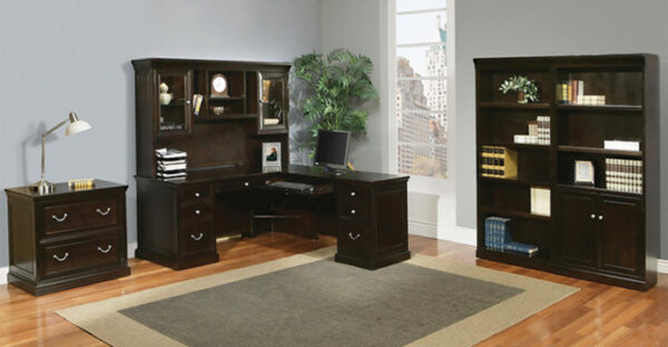 Elegant home office with dark wood furniture.