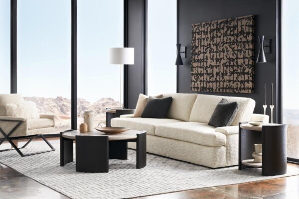 Modern living room with beige sofa and abstract art