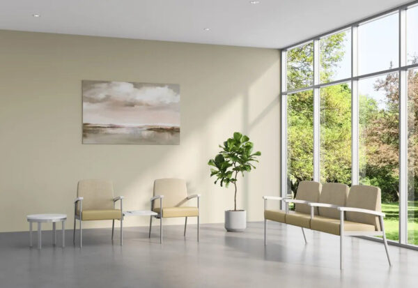 Modern waiting room with chairs and large windows.