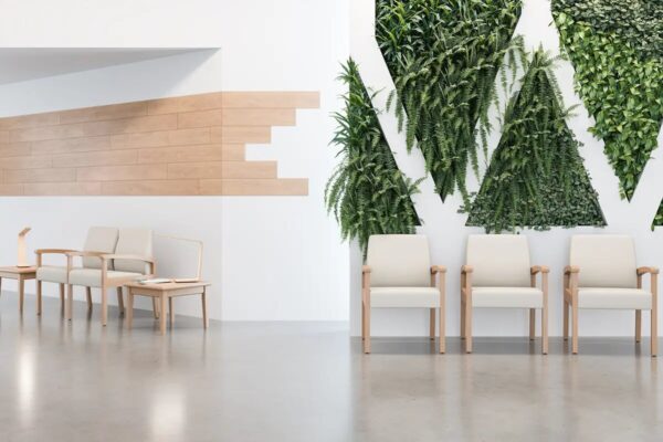 Modern waiting area with green vertical plants wall.