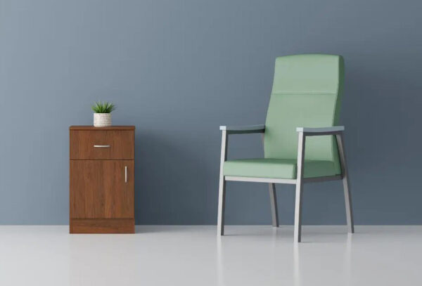 Green chair beside a wooden cabinet