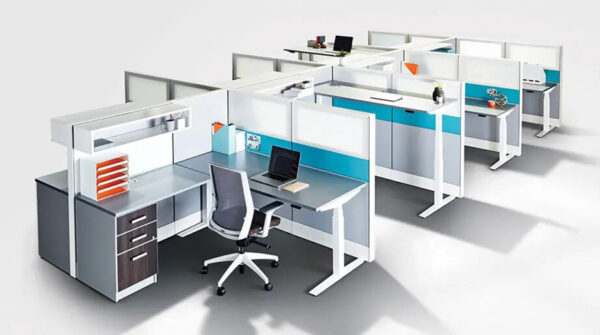 Modern office workstations with desks and dividers.