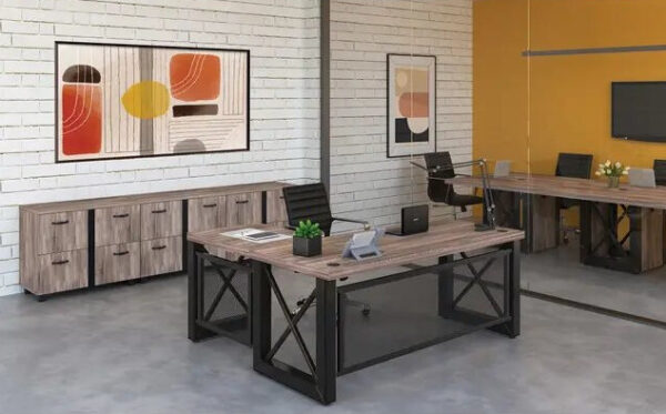 Modern office with desks, chairs, and wall artwork.