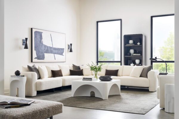 Modern living room with white sectional sofa.