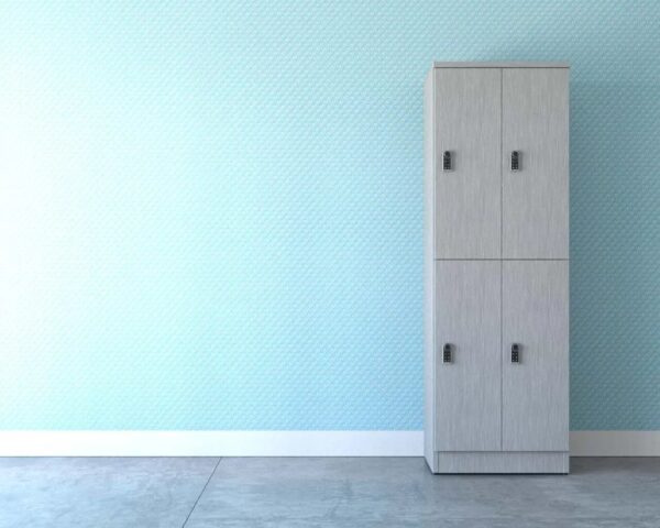 Gray cabinet with locks against blue wall background.