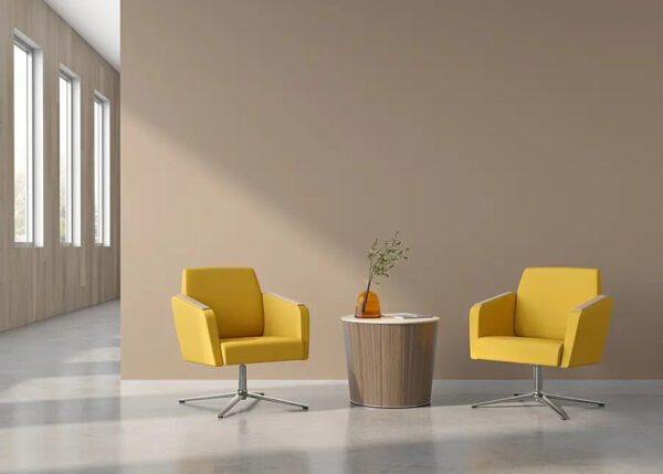 Modern yellow chairs with round table in office