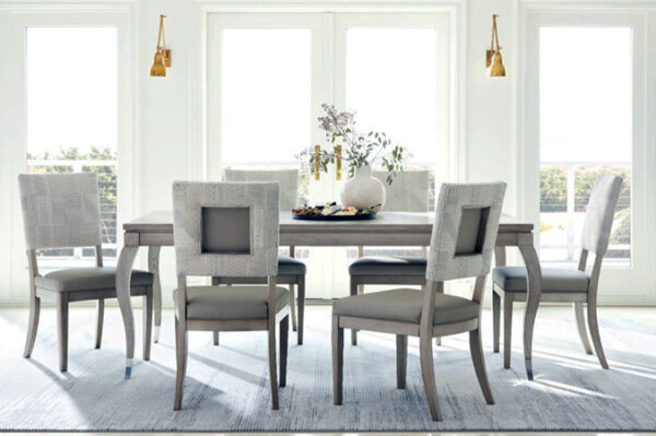 Modern dining room with elegant furniture and decor.