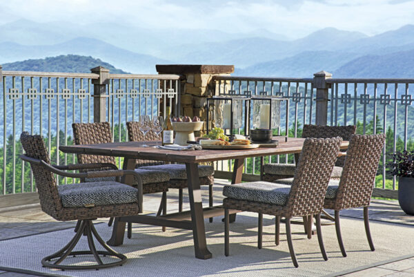 Outdoor dining set with mountain view.