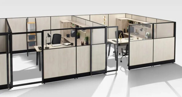 Modern office cubicle design with desks and chairs.