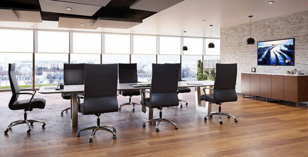 Modern conference room with city view windows.