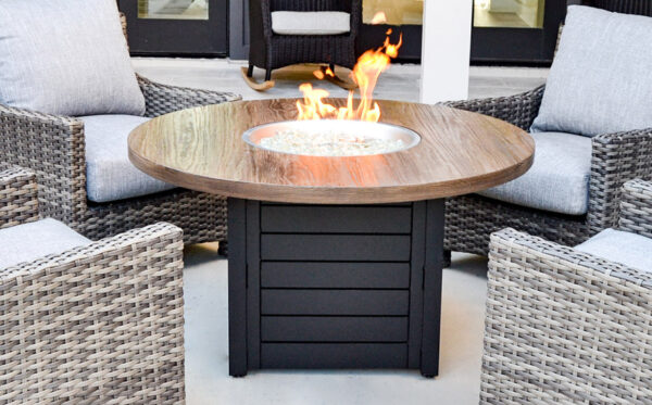 Outdoor fire pit table with wicker chairs