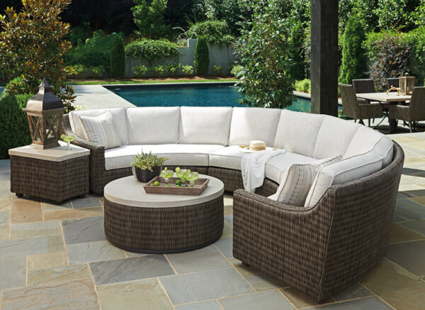 Outdoor patio with wicker furniture and pool