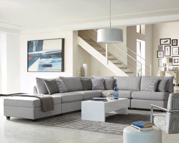 Modern living room with gray sectional sofa.