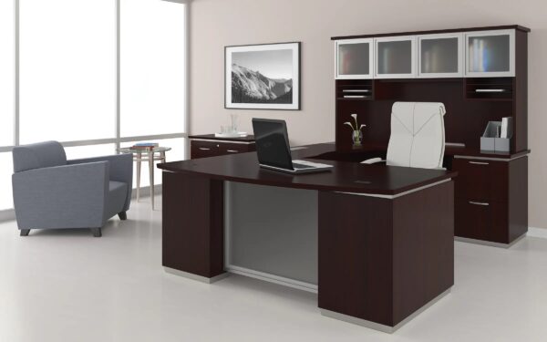 Modern office with desk, chair, and laptop.