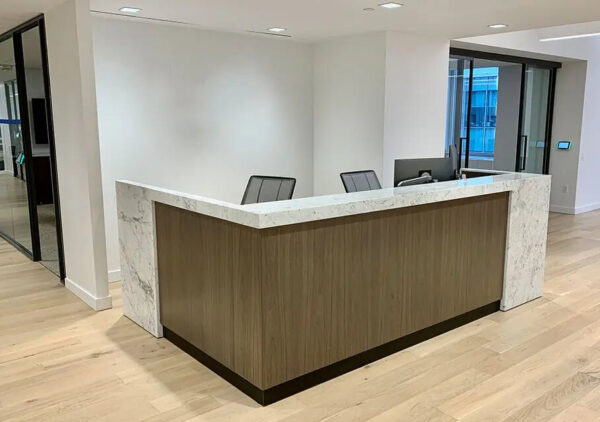 Modern office reception desk with marble countertop